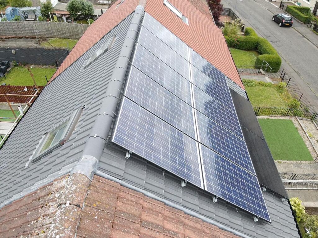Aerial view of a red tiled residential roof and roof extension